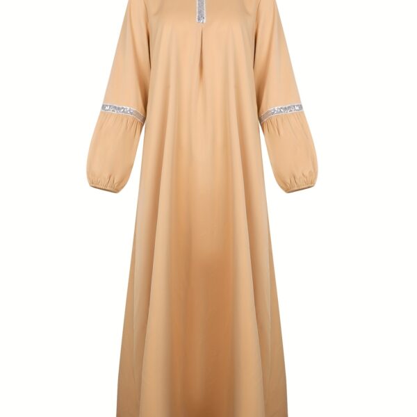 Exquisite Dubai Nights Sequined Abaya Dress from Newness, shimmering with elegance. Modern and stylish abaya design.