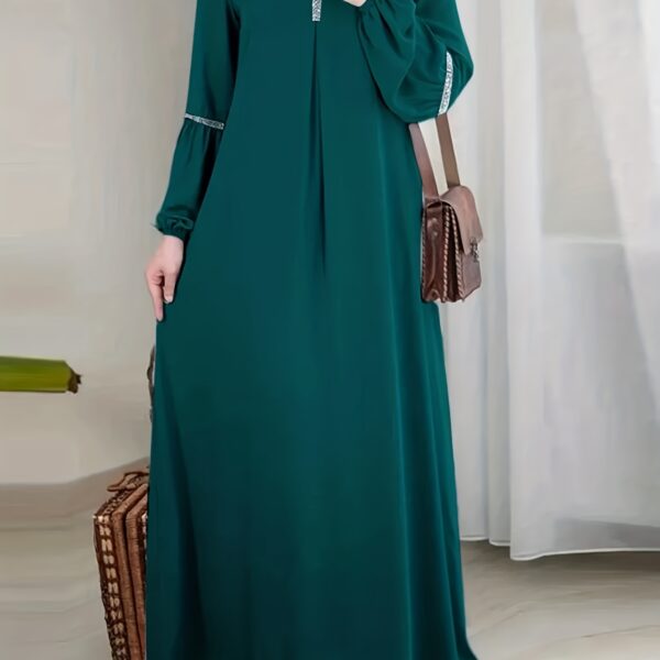 Exquisite Dubai Nights Sequined Abaya Dress from Newness, shimmering with elegance. Modern and stylish abaya design.