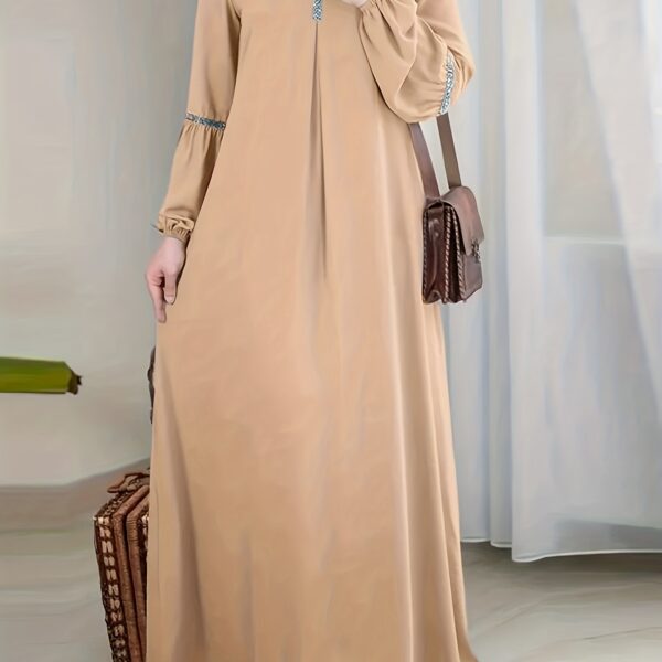 Exquisite Dubai Nights Sequined Abaya Dress from Newness, shimmering with elegance. Modern and stylish abaya design.
