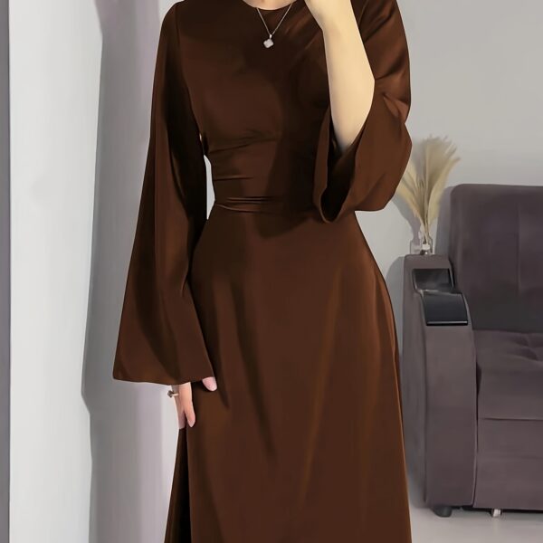 Model wearing the elegant Desert Bloom Arabian Dress, a versatile and flowing garment perfect for any occasion.