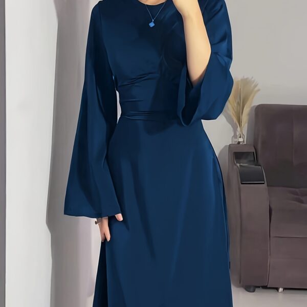 Model wearing the elegant Desert Bloom Arabian Dress, a versatile and flowing garment perfect for any occasion.