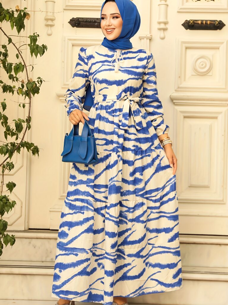 Embrace effortless style in the Newness Serengeti Sunset zebra print midi dress This dress features a flattering silhouette and a vibrant zebra print inspired by the African sunset