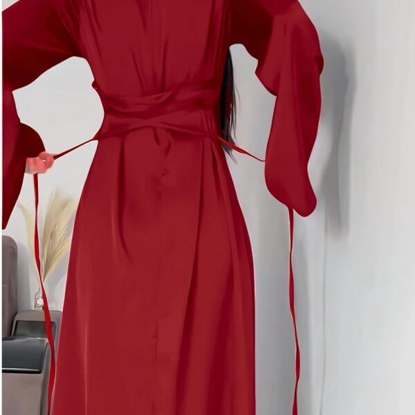 Model wearing the elegant Desert Bloom Arabian Dress, a versatile and flowing garment perfect for any occasion.