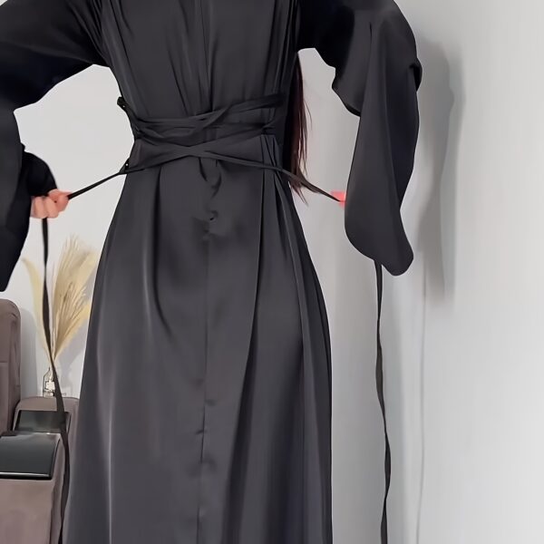 Model wearing the elegant Desert Bloom Arabian Dress, a versatile and flowing garment perfect for any occasion.
