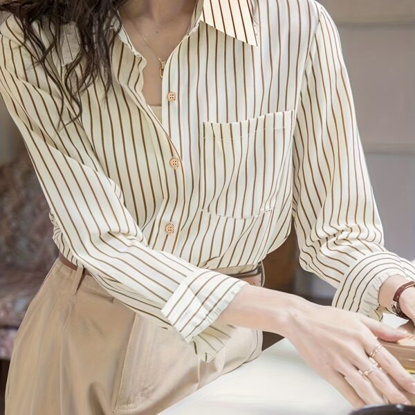 Effortless Elegance Striped Shirt by Newness. A versatile, stylish striped shirt perfect for any occasion.