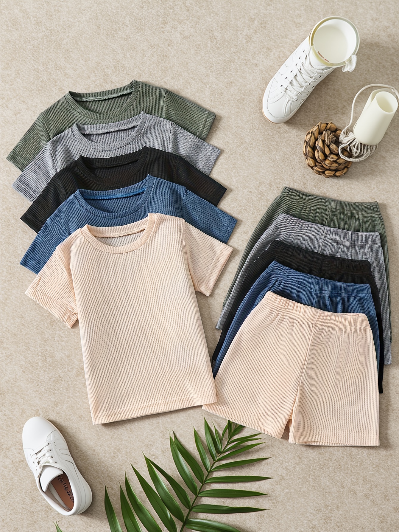 Newness Summer Playdate Boys' Knit Set: Stylish and comfortable knit set in a summery color scheme, perfect for playtime. Features a soft knit top and coordinating shorts.