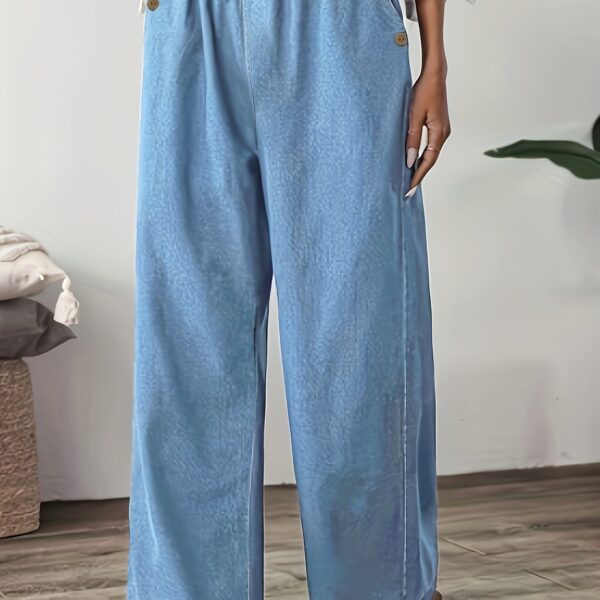 Flattering straight leg jeans in a versatile wash, showcasing a chic and effortless style. Model wearing Newness Effortless Chic Straight Leg Jeans.