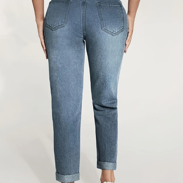 Flatlay showcasing Newness's Effortless Chic Elastic Waist Jeans in multiple washes, highlighting the comfortable elastic waistband and flattering fit.