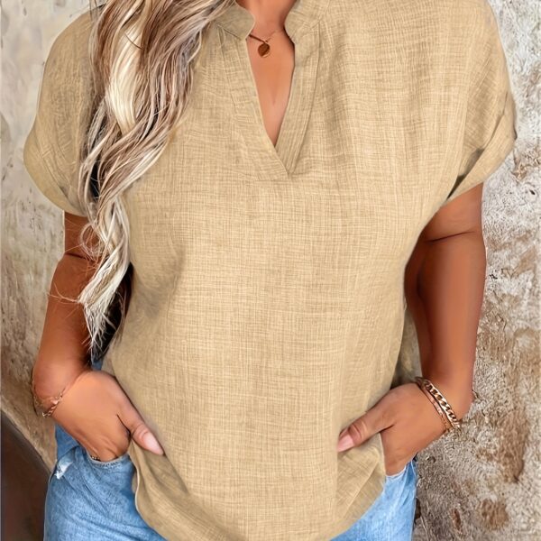Newness Sunlit Days V-Neck Blouse in a flattering pose, showcasing its versatility for spring, summer, and fall.