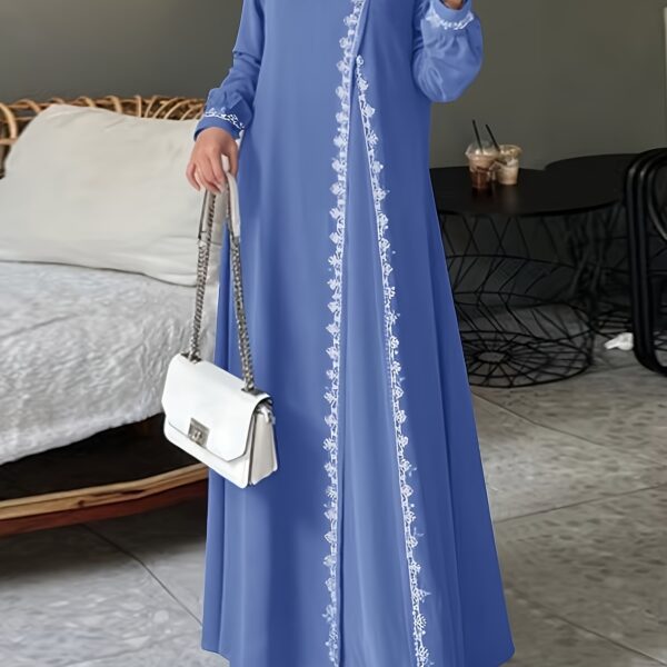 Model wearing the Newness Serene Crochet Maxi Dress, a stunning floor-length crochet dress perfect for any occasion. The dress drapes beautifully, showcasing its intricate crochet detailing.