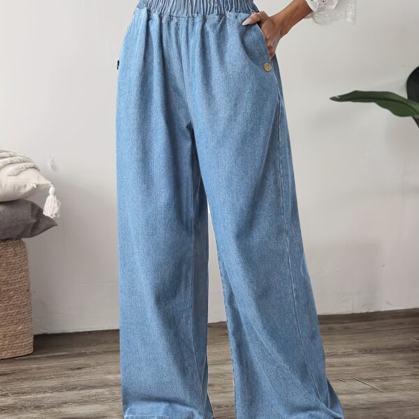 Flattering straight leg jeans in a versatile wash, showcasing a chic and effortless style. Model wearing Newness Effortless Chic Straight Leg Jeans.