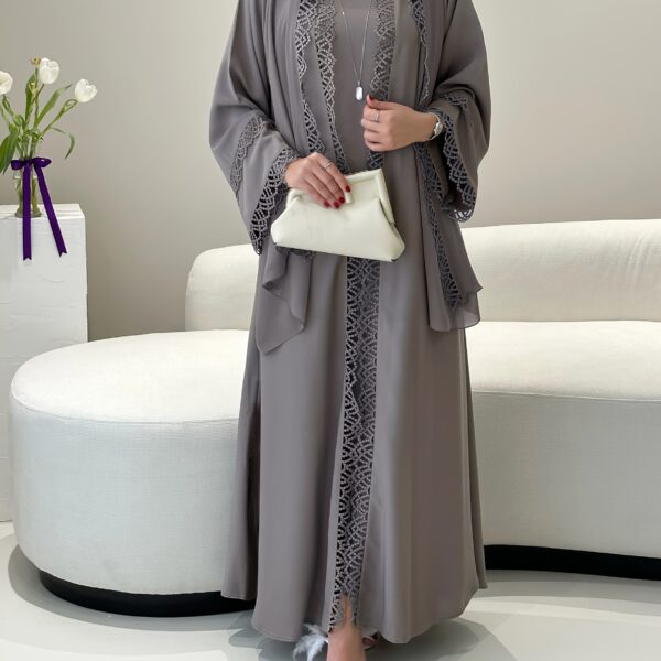 Exquisite Desert Bloom Lace Kaftan Set from Newness, perfect for Ramadan and special occasions. Features delicate lace detailing and a flowing silhouette.