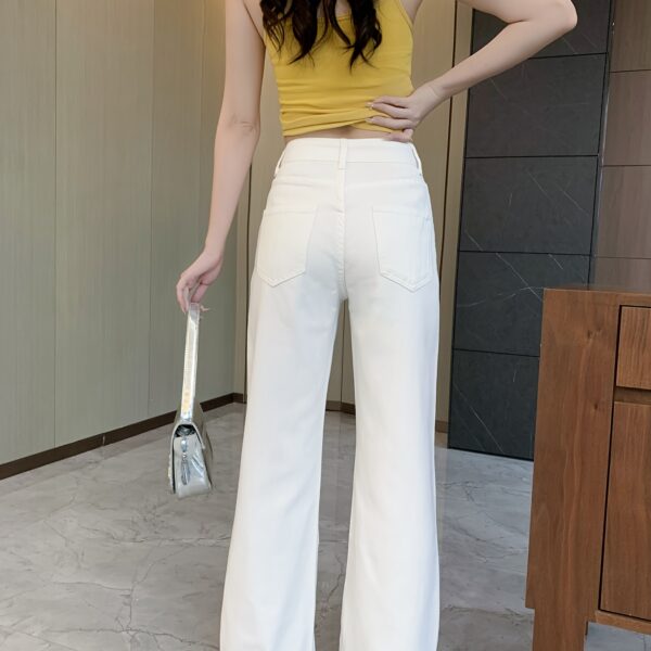 Newness Elevated White Wide Leg Jeans: A pair of elegant, white wide-leg jeans, perfect for any occasion.