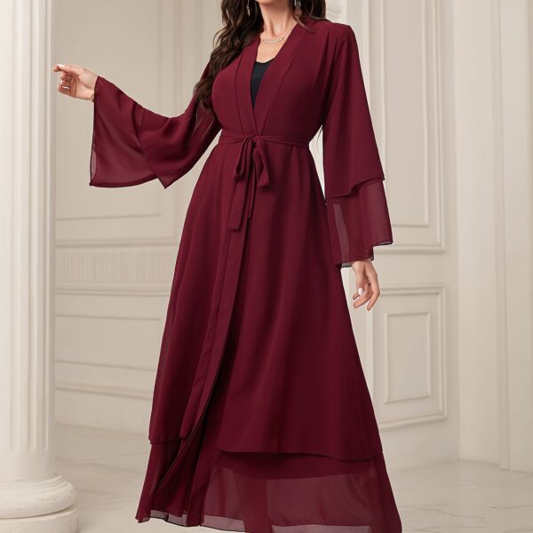 Effortless elegance in our Serene Serenity Abaya Maxi Dress. A stylish maxi dress perfect for any occasion.