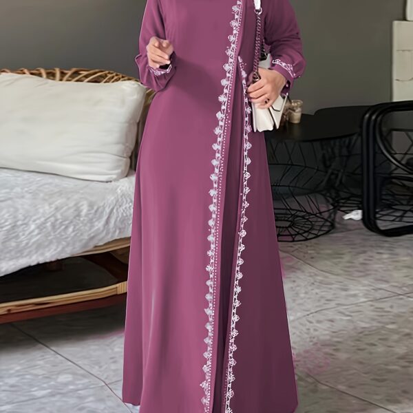 Model wearing the Newness Serene Crochet Maxi Dress, a stunning floor-length crochet dress perfect for any occasion. The dress drapes beautifully, showcasing its intricate crochet detailing.
