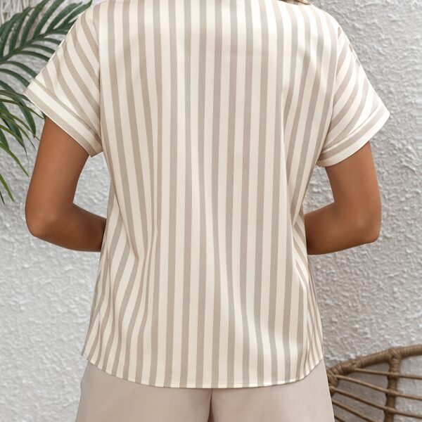 Effortless Elegance Striped Shirt by Newness. A versatile, stylish striped shirt perfect for any occasion.