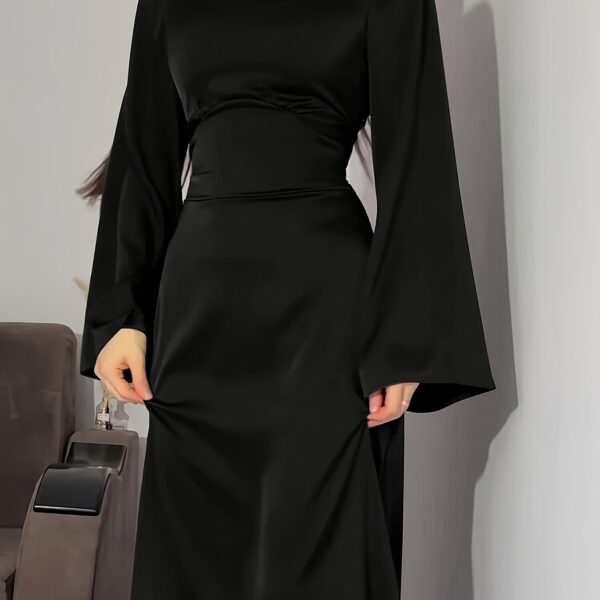 Model wearing the elegant Desert Bloom Arabian Dress, a versatile and flowing garment perfect for any occasion.