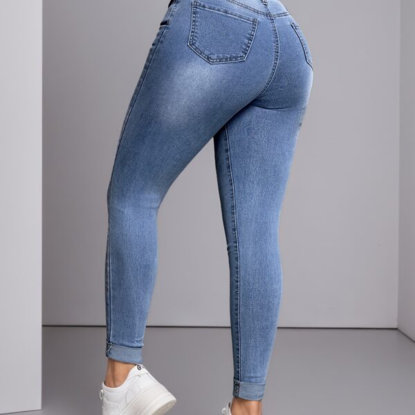 Flatlay image of Newness's Curated Slim Fit Jeans, showcasing the perfect slim fit and stylish details.