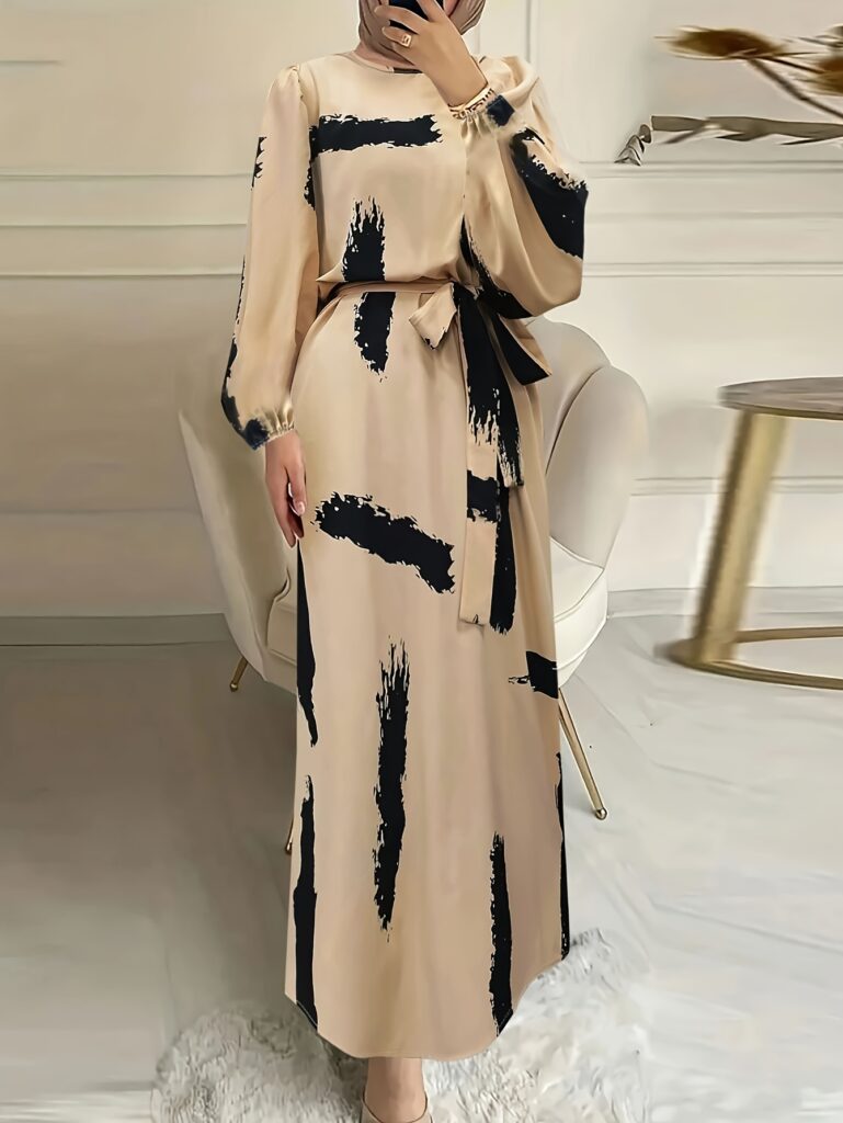 Model wearing the Casablanca Abaya Dress by Newness a modern and modest dress in a chic design