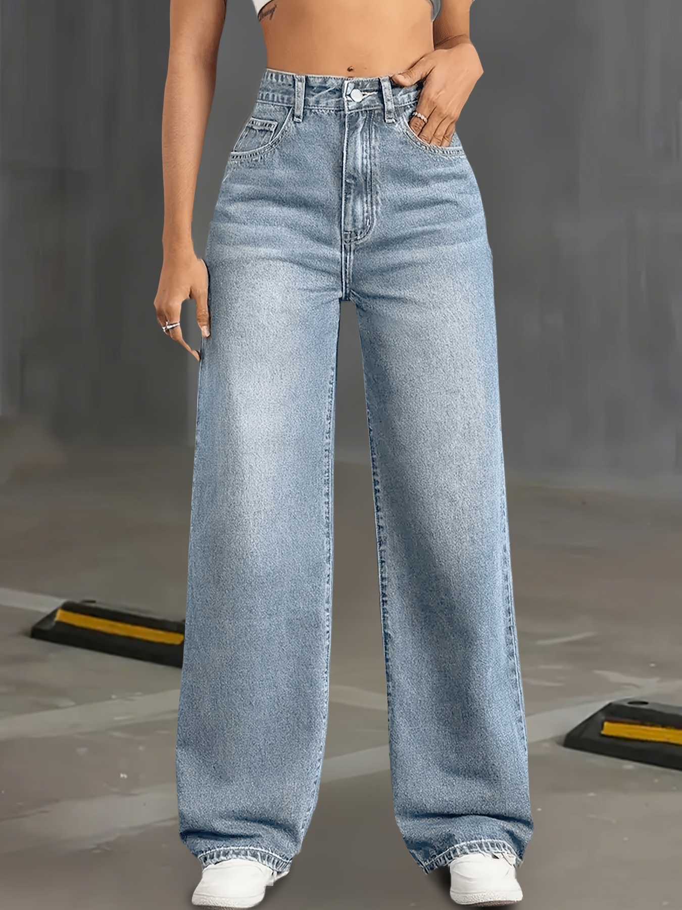 Newness Everyday Icon High-Waist Jeans: Flattering high-waist jeans in a variety of washes and sizes, showcasing a stylish and versatile fit.