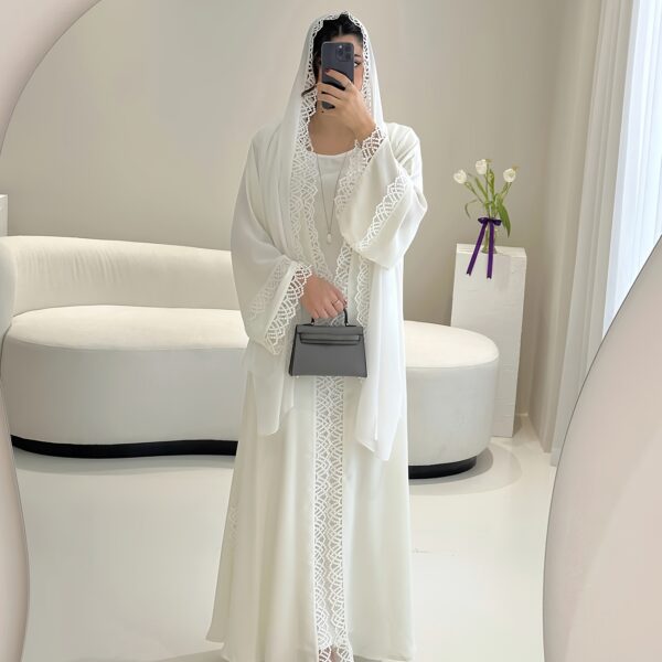Exquisite Desert Bloom Lace Kaftan Set from Newness, perfect for Ramadan and special occasions. Features delicate lace detailing and a flowing silhouette.