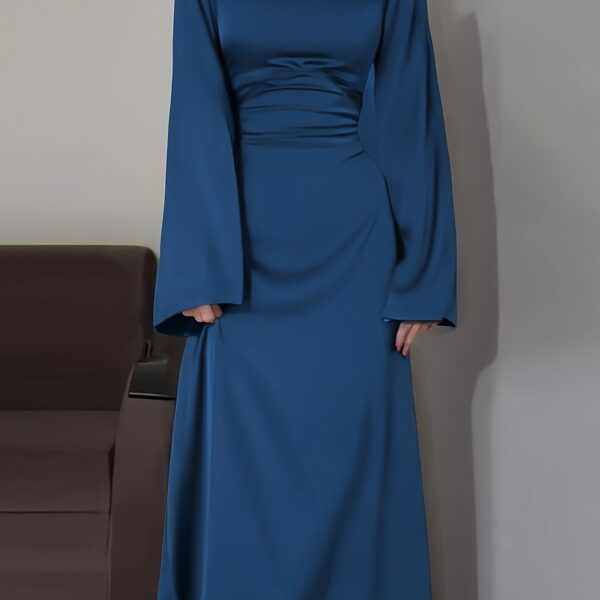Model wearing the elegant Desert Bloom Arabian Dress, a versatile and flowing garment perfect for any occasion.