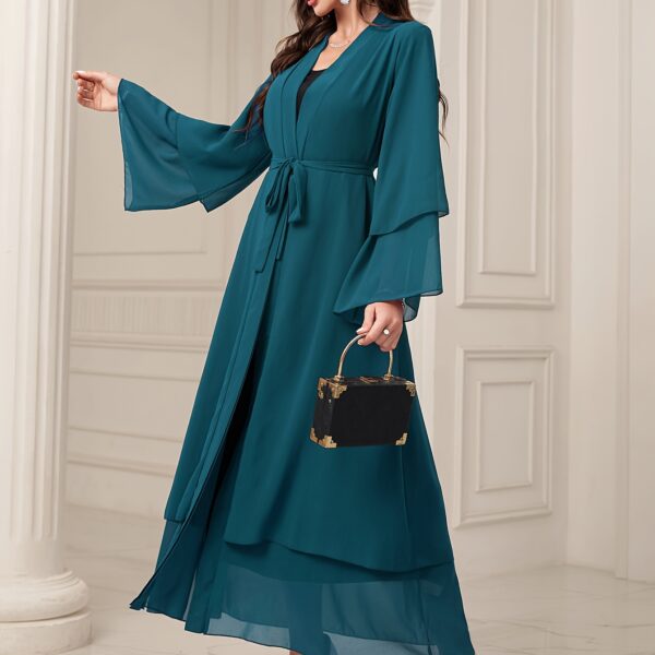 Effortless elegance in our Serene Serenity Abaya Maxi Dress. A stylish maxi dress perfect for any occasion.