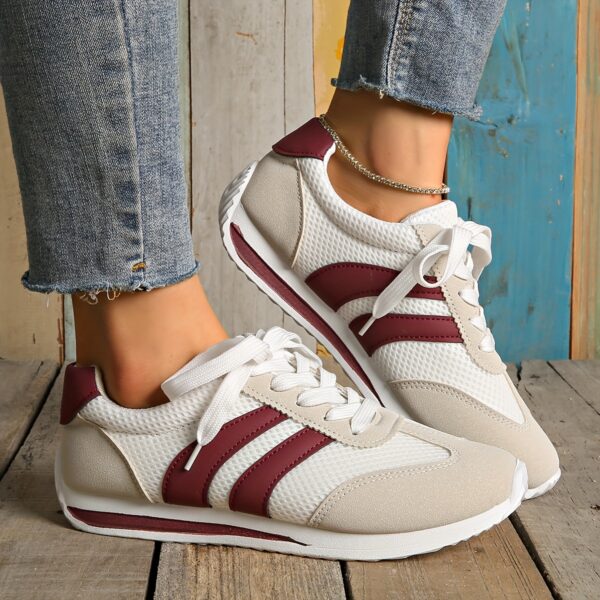 Newness City Walk Striped Sneakers: Elevate your everyday style with these trendy striped sneakers.