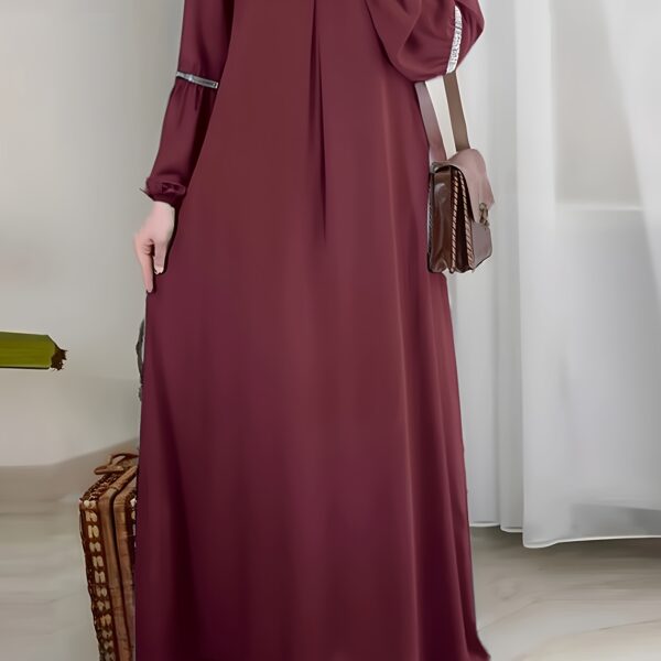 Exquisite Dubai Nights Sequined Abaya Dress from Newness, shimmering with elegance. Modern and stylish abaya design.