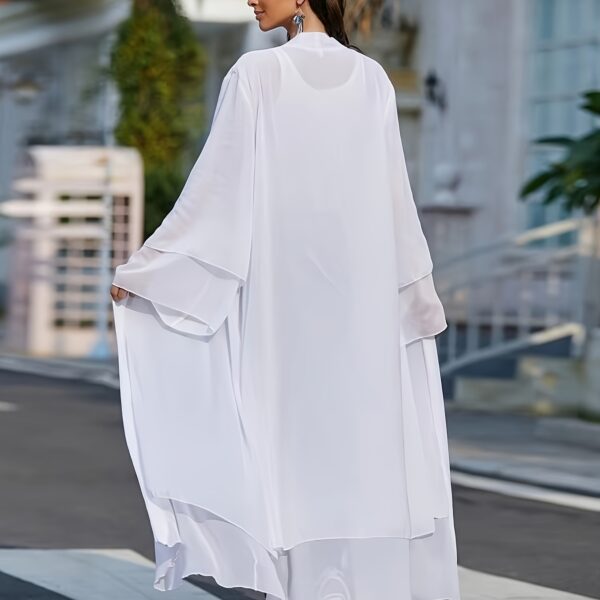 Effortless elegance in our Serene Serenity Abaya Maxi Dress. A stylish maxi dress perfect for any occasion.