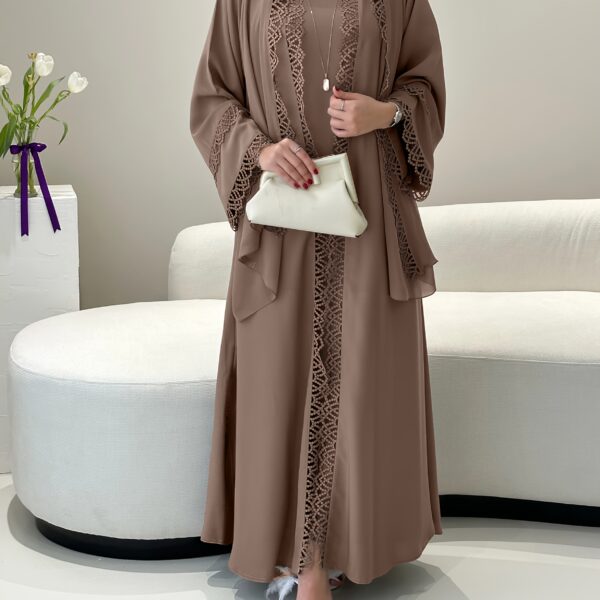 Exquisite Desert Bloom Lace Kaftan Set from Newness, perfect for Ramadan and special occasions. Features delicate lace detailing and a flowing silhouette.