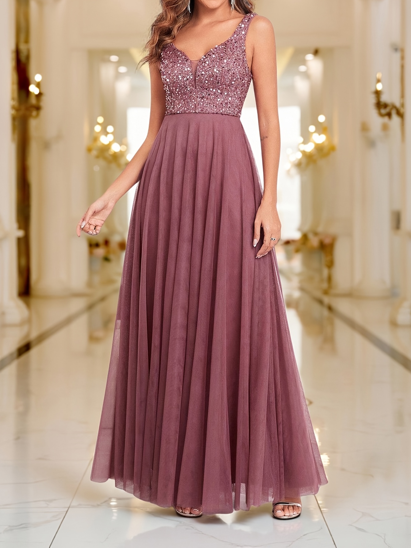 Celestial Sequin Gown from Newness: Sparkle and shine in this stunning sequin gown, perfect for weddings and galas. Features intricate sequin detailing and a flattering silhouette.