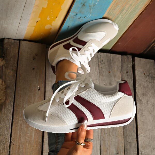 Newness City Walk Striped Sneakers: Elevate your everyday style with these trendy striped sneakers.