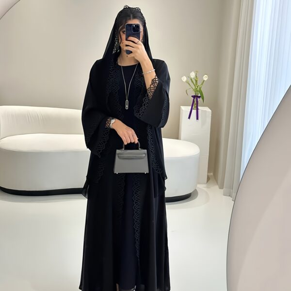 Exquisite Desert Bloom Lace Kaftan Set from Newness, perfect for Ramadan and special occasions. Features delicate lace detailing and a flowing silhouette.