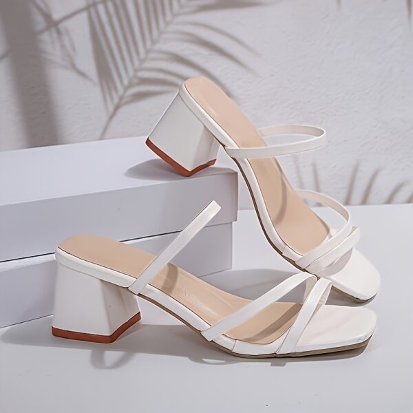 Newness Sunset Stroll Chunky Heel Sandals in summery sunset hues, perfect for weddings and parties.
