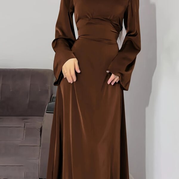 Model wearing the elegant Desert Bloom Arabian Dress, a versatile and flowing garment perfect for any occasion.
