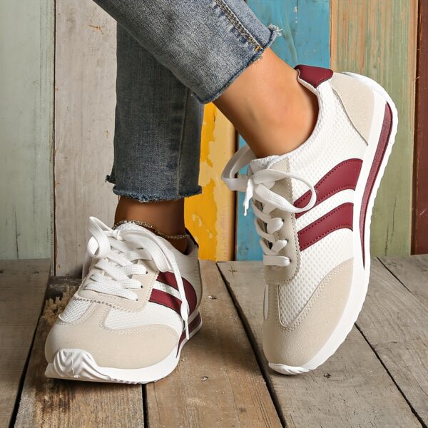 Newness City Walk Striped Sneakers: Elevate your everyday style with these trendy striped sneakers.