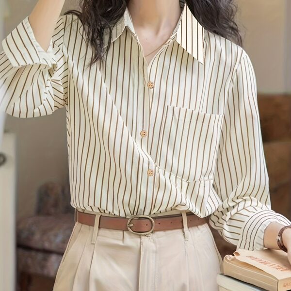 Effortless Elegance Striped Shirt by Newness. A versatile, stylish striped shirt perfect for any occasion.