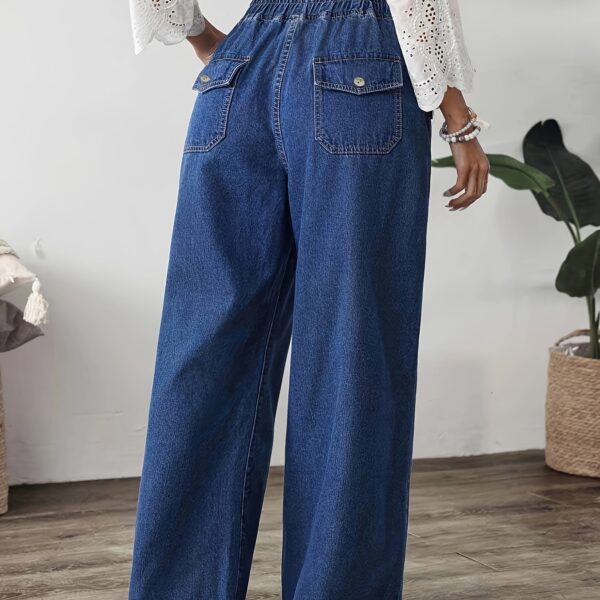 Flattering straight leg jeans in a versatile wash, showcasing a chic and effortless style. Model wearing Newness Effortless Chic Straight Leg Jeans.