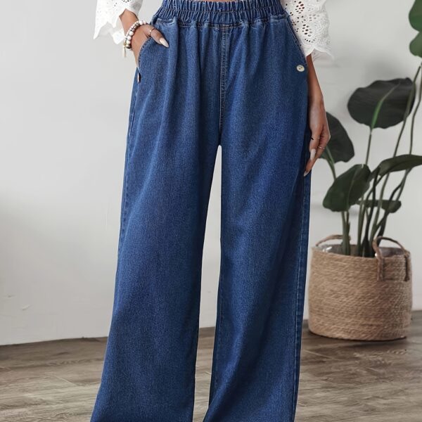 Flattering straight leg jeans in a versatile wash, showcasing a chic and effortless style. Model wearing Newness Effortless Chic Straight Leg Jeans.