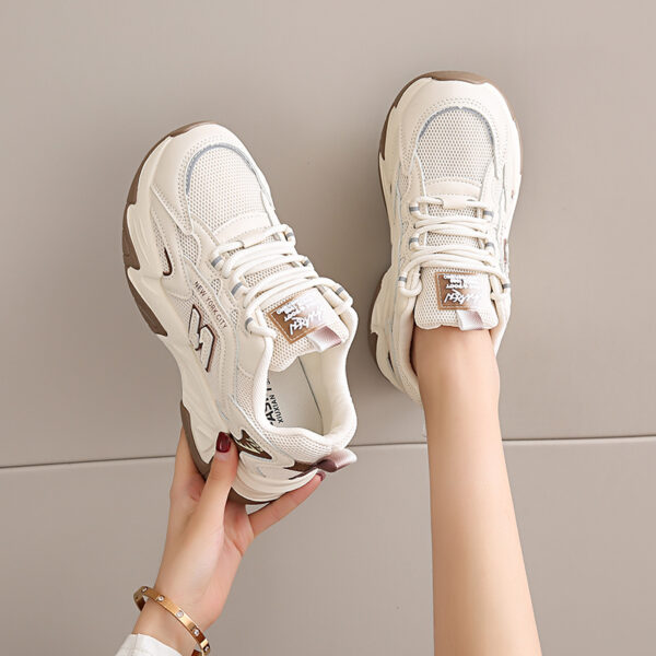 Newness CloudWalk White Sneakers: Comfortable, versatile white sneakers, perfect for any occasion. Shown in a stylish close-up.