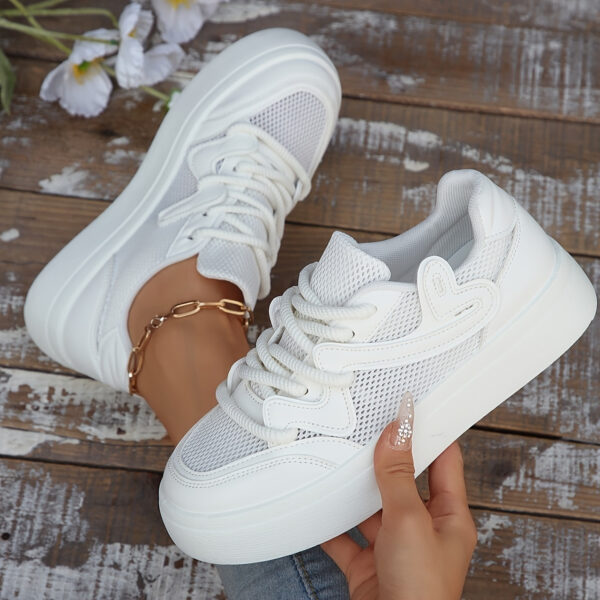 Newness Elevated Comfort Platform Sneakers in white, showcasing their stylish design and comfortable platform sole, perfect for everyday wear, the office, or formal events.