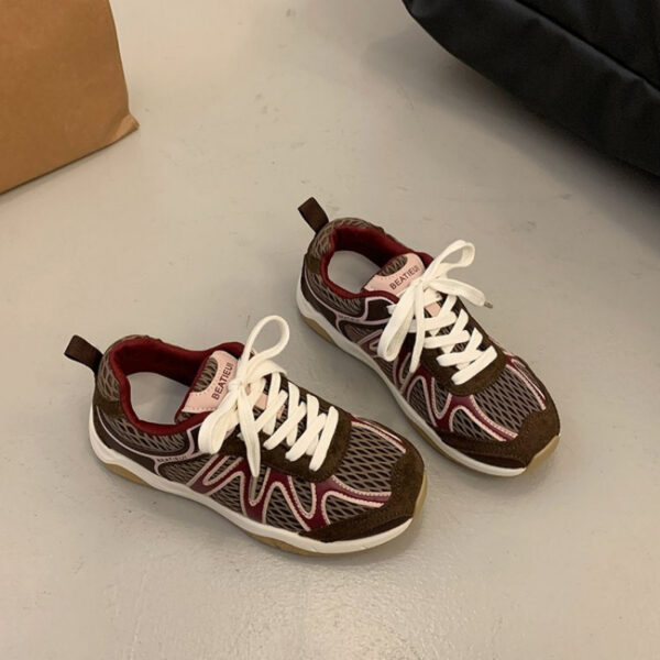 Newness Elevated Style Platform Sneakers in white, showcasing their chic design, comfortable platform sole, and stylish silhouette. Model is walking, highlighting ease of movement.