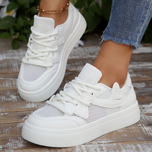 Newness Elevated Comfort Platform Sneakers in white, showcasing their stylish design and comfortable platform sole, perfect for everyday wear, the office, or formal events.