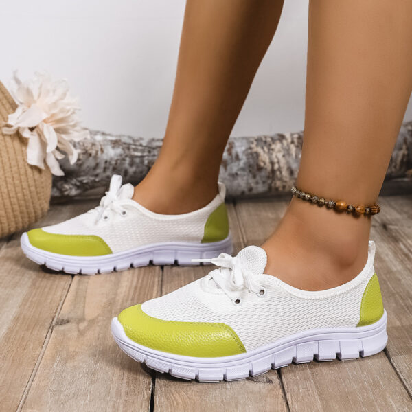 Newness Spring Stroll Color-Block Sneakers: A stylish and comfortable pair of color-block sneakers, perfect for spring. Features a vibrant color design and a fashionable silhouette.