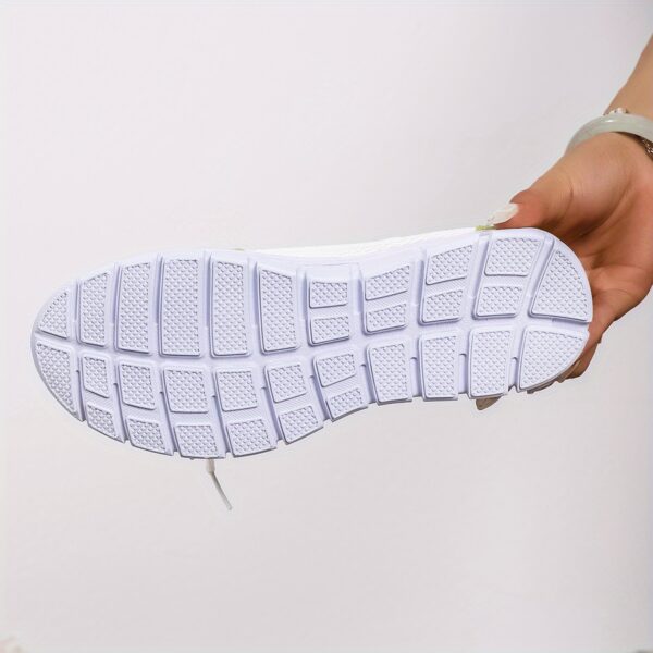 Newness Spring Stroll Color-Block Sneakers: A stylish and comfortable pair of color-block sneakers, perfect for spring. Features a vibrant color design and a fashionable silhouette.