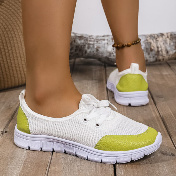 Newness Spring Stroll Color-Block Sneakers: A stylish and comfortable pair of color-block sneakers, perfect for spring. Features a vibrant color design and a fashionable silhouette.