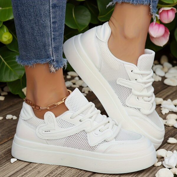 Newness Elevated Comfort Platform Sneakers in white, showcasing their stylish design and comfortable platform sole, perfect for everyday wear, the office, or formal events.