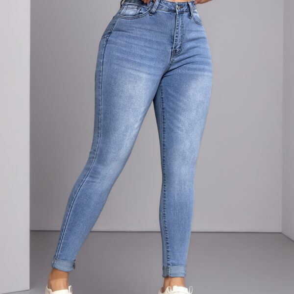 Flatlay image of Newness's Curated Slim Fit Jeans, showcasing the perfect slim fit and stylish details.