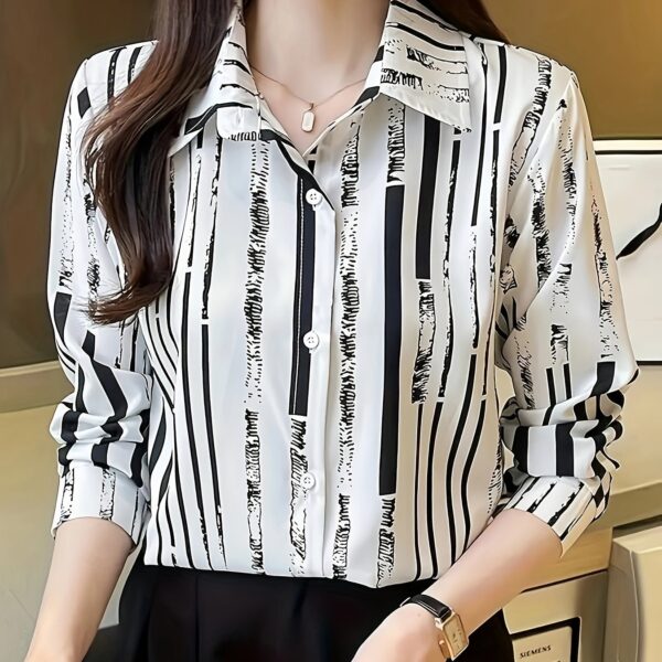Newness Effortless Chic Striped Polo Shirt in spring or fall. Model wearing a navy and white striped polo shirt.